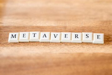 The word Metaverse on a wooden background.