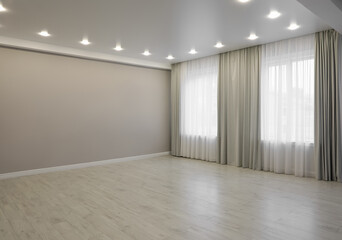 Fototapeta na wymiar Empty room with beige wall, large window and wooden floor