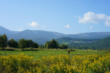 view of Karkonosze/ Giant Mountains in Poland from the village Ścieny in late summer