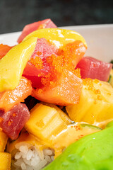 Raw fish poke bowl  with sauce