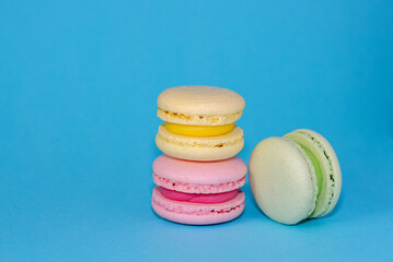 Macaroni with sweet almonds or dessert cake made of almond cookies, painted in the fashionable color of 2022. Very beautiful background.