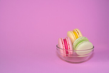 Macaroni with sweet almonds or dessert cake made of almond cookies, painted in the fashionable color of 2022. Very beautiful background.