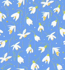 Fototapeta na wymiar Snowdrops flower vector seamless pattern on blue background. Spring botanical flat illustration for Wedding Invitation, Fabric, Wallpaper, Print, template