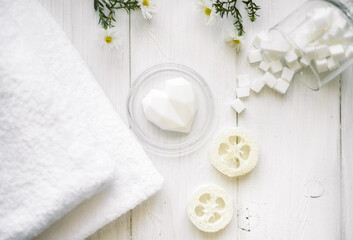 Fototapeta na wymiar natural eco beauty handmade herbal soap. luffa sponge, clay for making facial or body mask