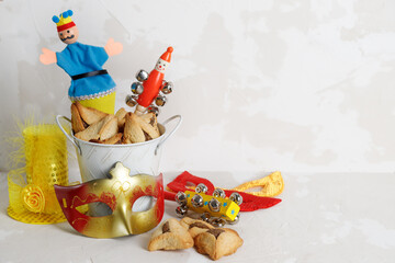 Carnival attributes and тraditional jewish sweets hamantaschen cookies. Purim