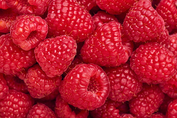 Background from fresh, juicy and ripe raspberries, macro photography, shallow depth of field