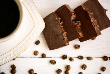 Dark chocolate, handmade sweet coffee soap, aromatic cinnamon and sweets. whole bean coffee
