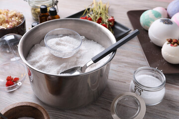 Composition with bath bomb ingredients on wooden table