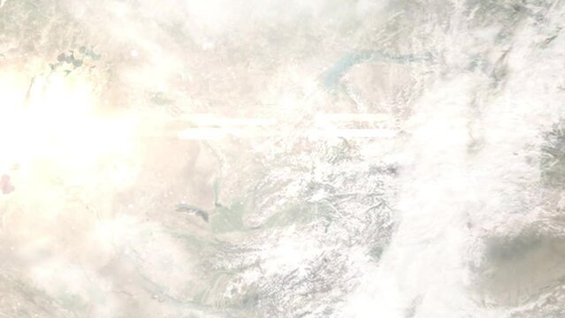Earth zoom in from outer space to city. Zooming on Kazakhstan, Taraz. The animation continues by zoom out through clouds and atmosphere into space. Images from NASA