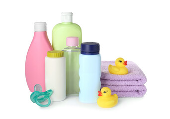 Obraz na płótnie Canvas Bottles of baby cosmetic products, towels, pacifier and rubber ducks on white background