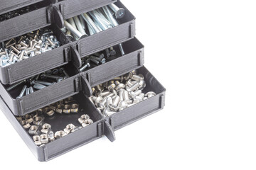 Boxes full with nuts and bolts. Workshop concept with tool box.