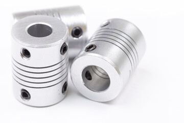 Aluminum flexible cnc shaft couplings isolated above white background