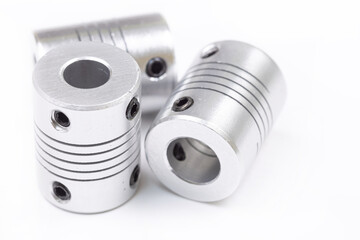 Aluminum flexible cnc shaft couplings isolated above white background