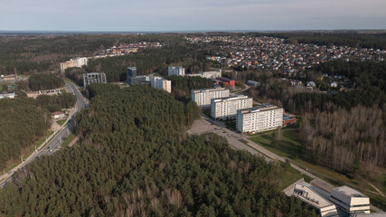 Modern bright buildings in the middle of forest