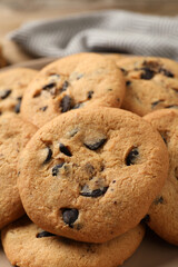 Delicious chocolate chip cookies on plate, closeup