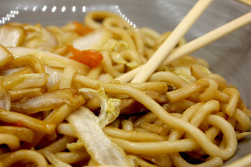 Chinese udon noodles with chopsticks