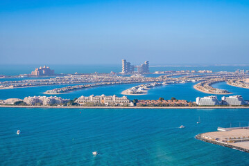 Aerial view on Palm Jumeira island in Dubai, UAE, on a summer day.