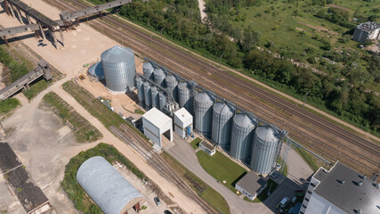 Grain Storage Silos next to Railway © Rytis