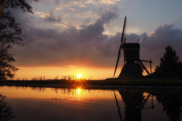 windmill at sunset, netherlands
