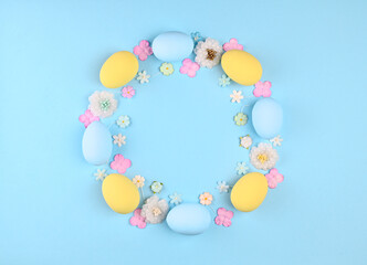 Easter wreath of colorful painted eggs and flowers
