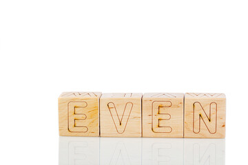 Wooden cubes with letters even on a white background