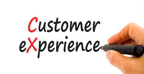 CX customer experience symbol. Concept words CX customer experience on white paper. Businessman hand with marker. Beautiful white background. Copy space. Business and CX customer experience concept.