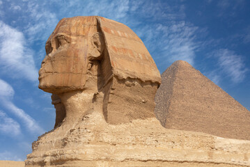 Great Sphinx and great Pyramid of Giza near Cairo, Egypt. It is mythical creature with the head of man and the body of a lion. The face of the Sphinx appears to represent the pharaoh Khafre