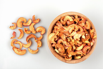 Dried apples in a bowl on white background	