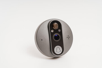 electronic door peephole with call button on a white background. 