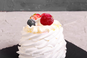 dessert anna pavlova with berries close up