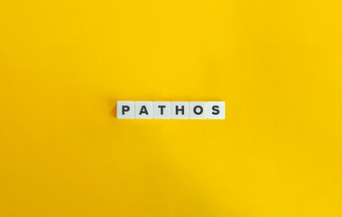 Pathos Word on Letter Tiles on Yellow Background. Minimal Aesthetics.