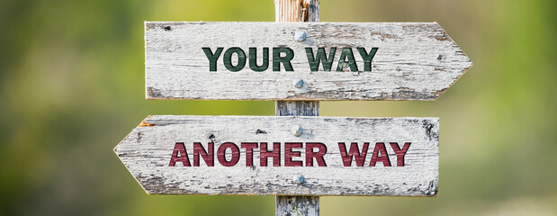 opposite signs on wooden signpost with the text quote your way another way engraved. Web banner format. - obrazy, fototapety, plakaty