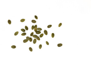 heap of green pumpkin seeds, close up