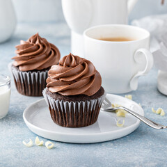 Dark chocolate cupcakes with whipped ganache frosting