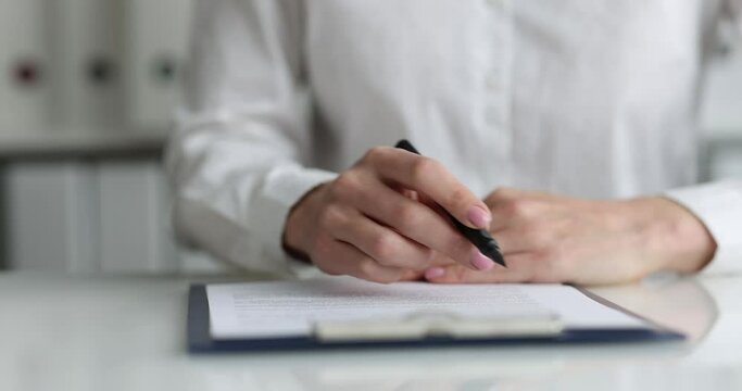 Person signs contract or loan documents slow motion 4k movie