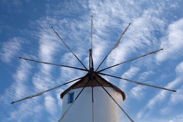Old white windmill at sunset in Parikia on Paros Island, Cyclades, Greece