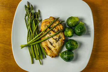 chicken cutlet with asparagus and brussel sprouts