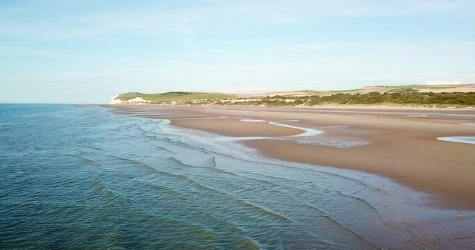 aerial footage of the beach between Wissant and the cliffs of cap blanc nez at the opal coast in summer, English channel, Cape White Nose, Pas-de-Calais, Hauts-de-France, France, aerial view