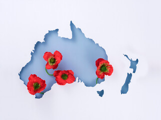 Anzac day. Remembrance day poppy symbol with outline of australian continent. Australia and New Zealand national day of commemoration