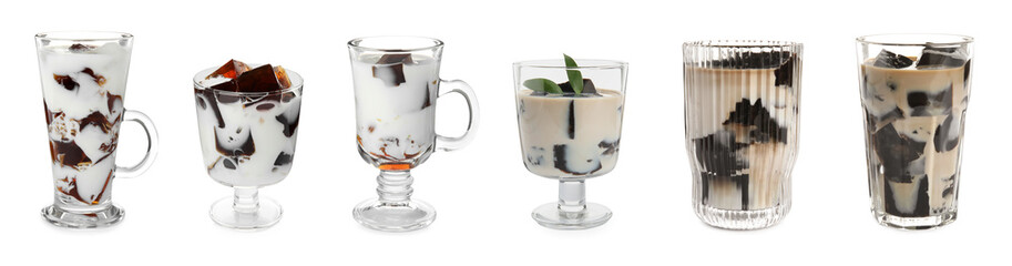 Glasses of milk with tasty grass jelly on white background. Banner design