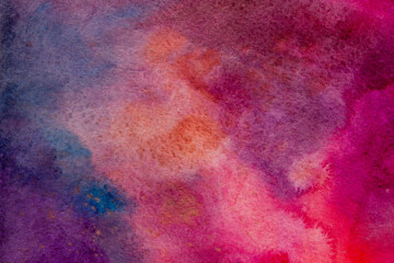 Vibrant purple, blue, pink and red hand painted galactic nebula looking watercolor background.
