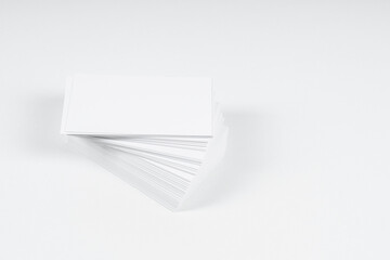 Photo of business cards stack. Template for branding identity. Isolated with clipping path. Mockup   business cards at white  background.