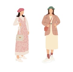 A set of stylish people in fashionable casual outfits with accessories and bags. Young modern women in fashionable spring and summer clothes. Color flat illustration isolated on a white background