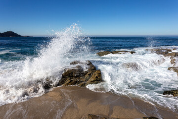 A view on the Pacific ocean with sky and waves