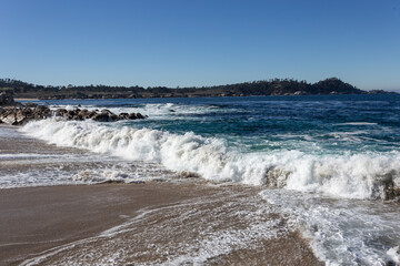 A view on the Pacific ocean with sky and waves