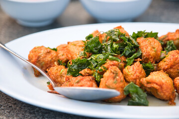 Deep fried fish cakes and crispy basil leaves Suitable for food menu illustrations, background or wallpaper