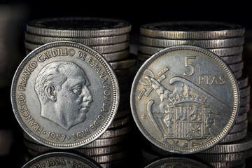 Francisco Franco Five Pesetas Coin 1957 Obverse Reverse Close Up Coin Stacks Black Background Macro