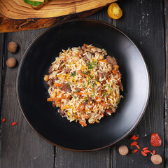 pilaf on a black plate food photography