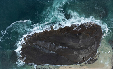 Overhead view of the large rock formation at Mollymook beach in NSW Australia