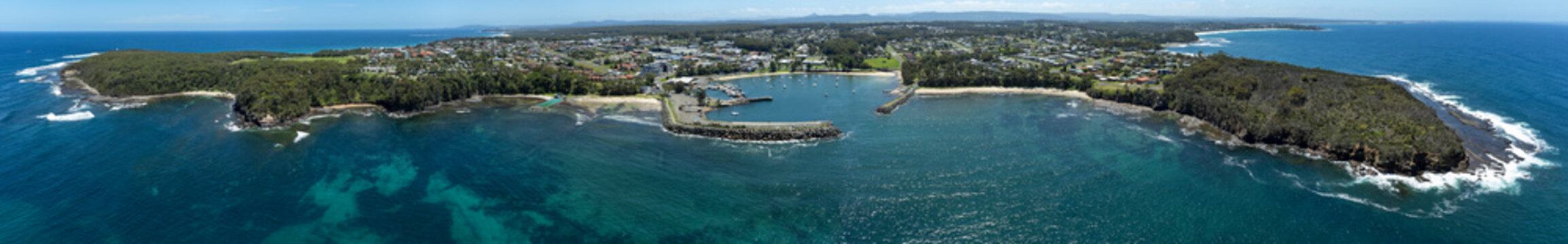 Aerial panorama of the harbour at Ulladulla, NSW, Australia